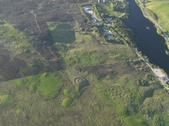 General oblique aerial view of the settlement enclosure on The Ord, Lairg, taken from the SSW.