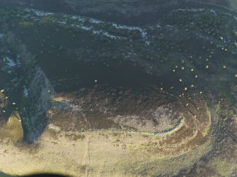 Oblique aerial view of the remains of the unfinished fort at Cnoc an Duin, taken from the N.