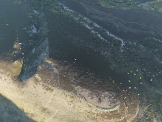 Oblique aerial view of the remains of the unfinished fort at Cnoc an Duin, taken from the NW.