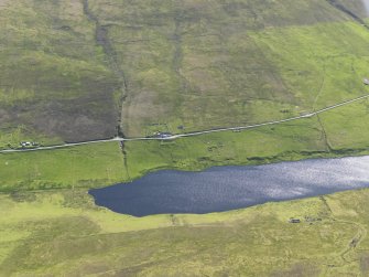 Oblique aerial view centred on the Loch of Vatsetter with Lochside in the foreground, taken from the W.