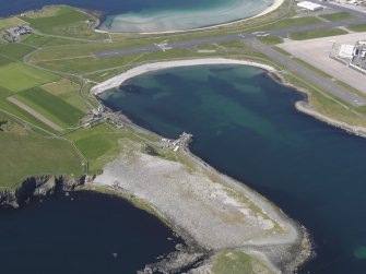 Oblique aerial view centred on the Links of Sumburgh and Grutness Voe, taken from the E.