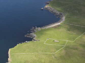 General oblique aerial view centred on the Broch of Mousa with The Haa adjacent, taken from the S.