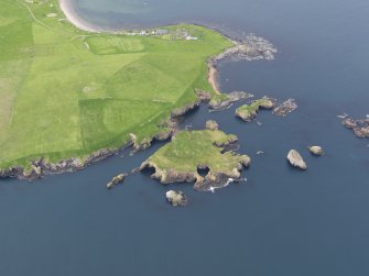 Oblique aerial view of Brei Holm, Papa Stour, looking NW.