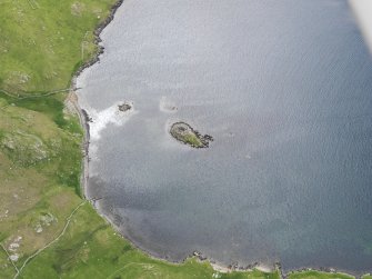 Oblique aerial view of the broch at West Burra Firth, looking S.