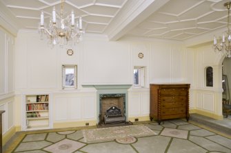 Interior. View of east wall of main drawing room, with fireplace and flanking openings