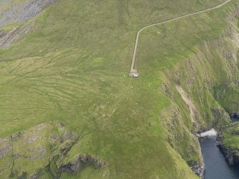 Oblique aerial view of the northern part of the Saxa Vord radar station, looking SSE.
