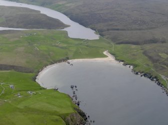 General oblique aerial view of Burrafirth with the Loch of Cliff beyond, looking SW.