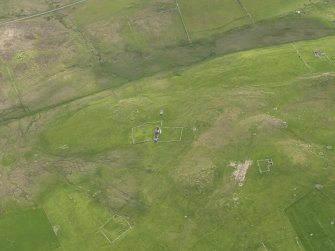 Oblique aerial view of the farmsteads, looking WSW.