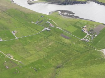 Oblique aerial view of Kellister, Yell, looking ESE.