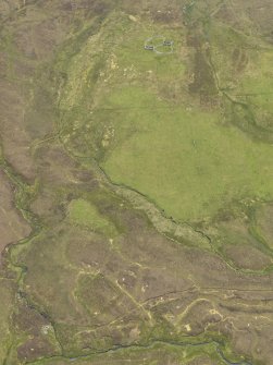 Oblique aerial view of the buildings and folds at Lumbister, looking SW.