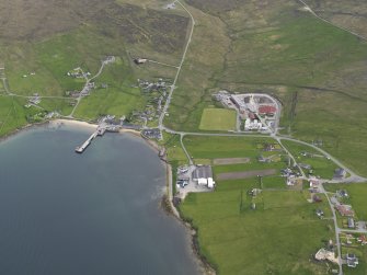 Oblique aerial view of Mid Yell, looking SSE.