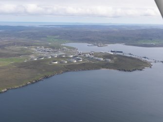 General oblique aerial view of Sullom Voe oil terminal, looking SSW.