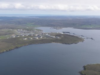 General oblique aerial view of Sullom Voe oil terminal, looking SSW.