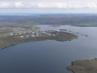 General oblique aerial view of Sullom Voe oil terminal, looking SSW.