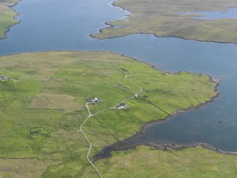 General oblique aerial view of West Houlland with Gruting Voe eyond, looking S.