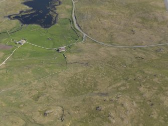 Oblique aerial view of Scord of Brouster, looking SE.