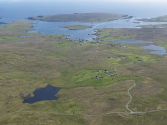 General oblique aerial view of Brunatwatt and Walls with Linga, the Vaila Sound and Vaila beyond, looking SSW.
