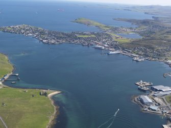 General oblique aerial view of Lerwick with Heogan in the foreground, looking SSW.