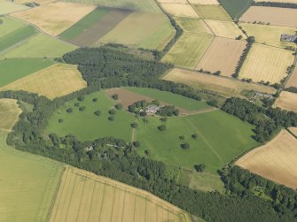 General oblique aerial view of Guynd country house and policies, taken from the SE.