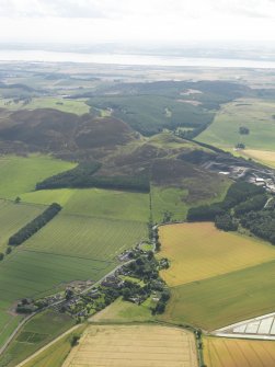 General oblique aerial view lookig across Collace towards Dunsinane Hill and the Carse of Gowrie and Firth of Tay beyond, taken from the NW.
