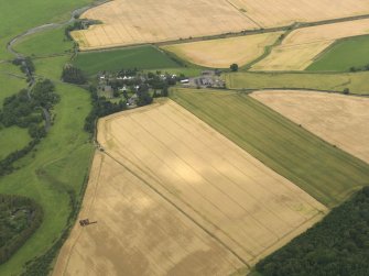 Oblique aerial view of the excavation trench with Foreteviot village beyond, taken from the S.