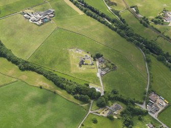 Oblique aerial view of Glenluce Abbey, taken from the NNE.