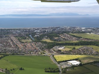 General oblique aerial view looking across Ayr towards Arran in the distance, taken from the ESE.