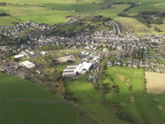 General oblique aerial view centred on the newly constructed Biggar High School, taken from the SSE.