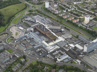 Oblique aerial view of East Kilbride shopping centre, taken from the NNW.