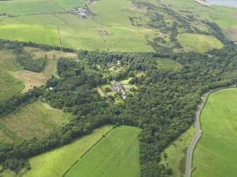 General oblique aerial view of Glenapp Castle and policies, taken from the ENE.