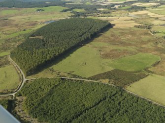 General oblique aerial view looking across the remains of Elsie the Greater Recumbent Stone Circle, taken from the ENE.