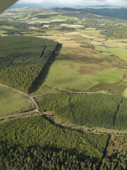 General oblique aerial view looking across the remains of Elsie the Greater Recumbent Stone Circle, taken from the ESE.