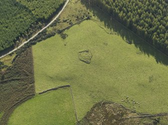 Oblique aerial view of the remains of Elsie the Greater Recumbent Stone Circle, taken from the WNW.