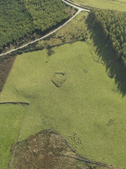 Oblique aerial view of the remains of Elsie the Greater Recumbent Stone Circle, taken from the NW.