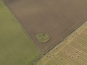 Oblique aerial view of the remains of Balquhain Recumbent Stone Circle, taken from the NE.