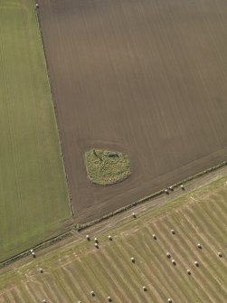 Oblique aerial view of the remains of Balquhain Recumbent Stone Circle, taken from the NNE.