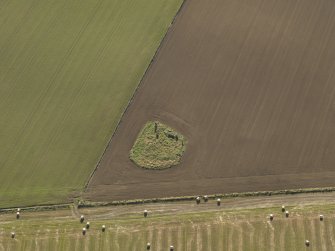 Oblique aerial view of the remains of Balquhain Recumbent Stone Circle, taken from the NNW.