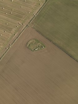 Oblique aerial view of the remains of Balquhain Recumbent Stone Circle, taken from the WSW.