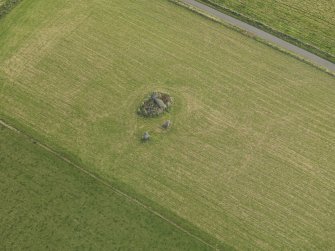 Oblique aerial view of the remains of the recumbent stone circle at Kirkton of Bourtie, taken from the NW.