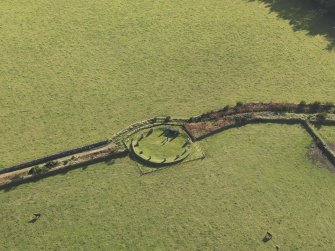 Oblique aerial view of East Aquhorthies recumbent stone circle, taken from the NNW.