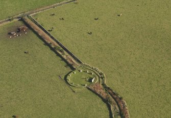 Oblique aerial view of East Aquhorthies recumbent stone circle, taken from the WNW.