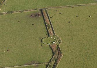 Oblique aerial view of East Aquhorthies recumbent stone circle, taken from the W.
