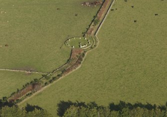 Oblique aerial view of East Aquhorthies recumbent stone circle, taken from the WSW.