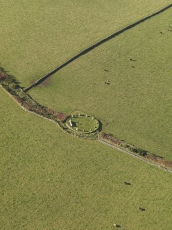 Oblique aerial view of East Aquhorthies recumbent stone circle, taken from the SE.