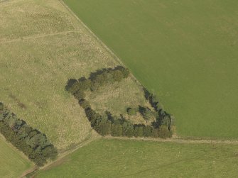 Oblique aerial view of Dunnideer recumbent stone circle, taken from the SW.