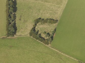 Oblique aerial view of Dunnideer recumbent stone circle, taken from the SSW.