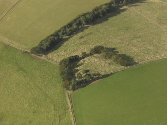 Oblique aerial view of Dunnideer recumbent stone circle, taken from the SSE.
