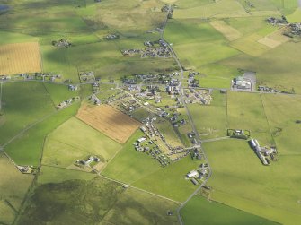 General oblique aerial view centred on Dounby during the Orkney West Mainland Agricultural Society Show, taken from the SW.