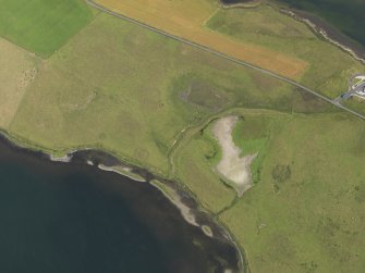 Oblique aerial view centred on the barrow at Bookan, taken from the SSW.