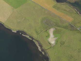 Oblique aerial view centred on the barrow at Bookan, taken from the SSW.